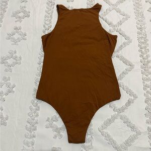 SKIMS: The "Fits Everybody" High Neck Bodysuit in Copper